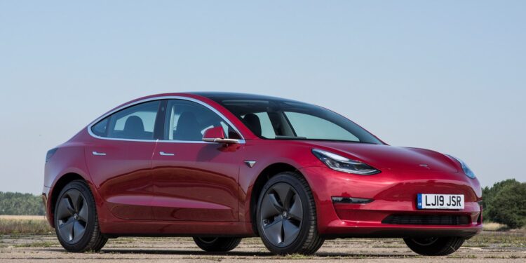 Red Tesla Model 3 750x375 - Tesla Model 3 become 2nd best-selling vehicle in UK by 2021