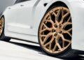 Sporty Touring Tesla Model 3 with Gold Rims and Roof Box 4 120x86 - Sporty Touring Tesla Model 3 with Gold Rims and Roof Box