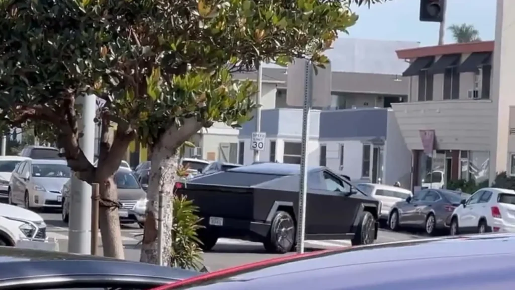 Tesla’s Chief Designer Spotted in Matte Black Cybertruck, Fueling Speculation of Upcoming Factory Wrap Option