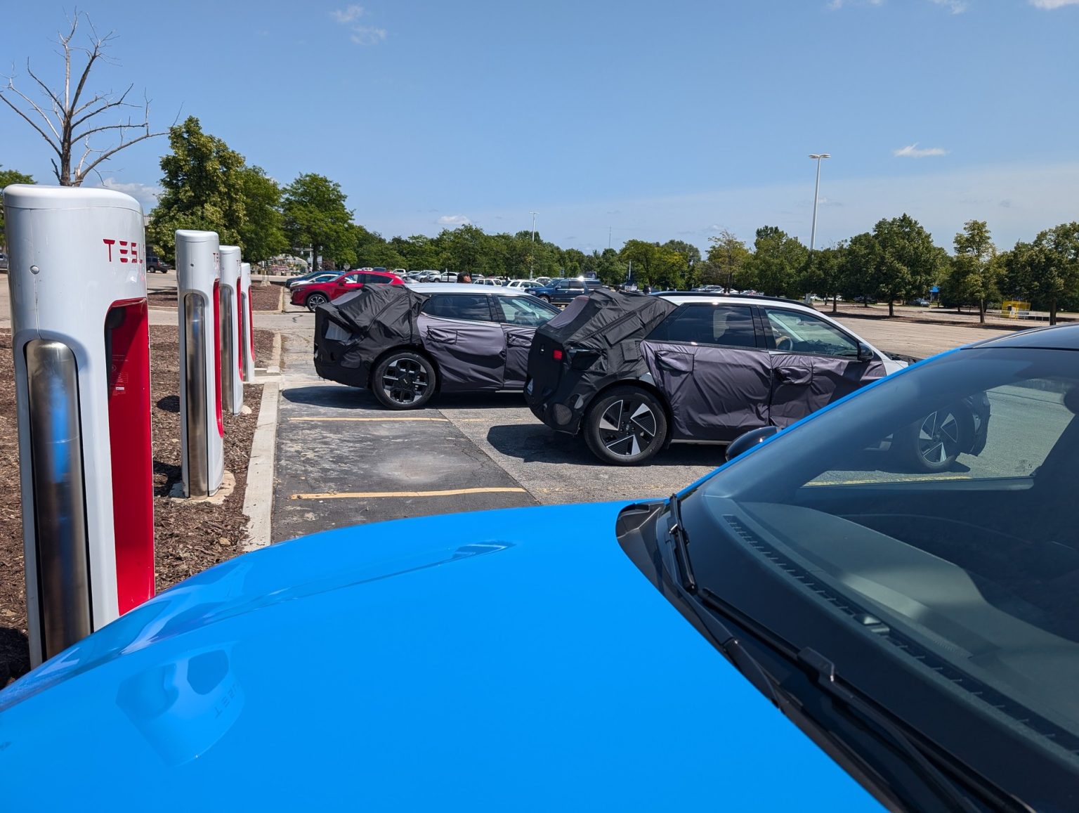 Hyundai Ioniq 5 and Kia EV6 Seen Testing Native NACS Charging Ports