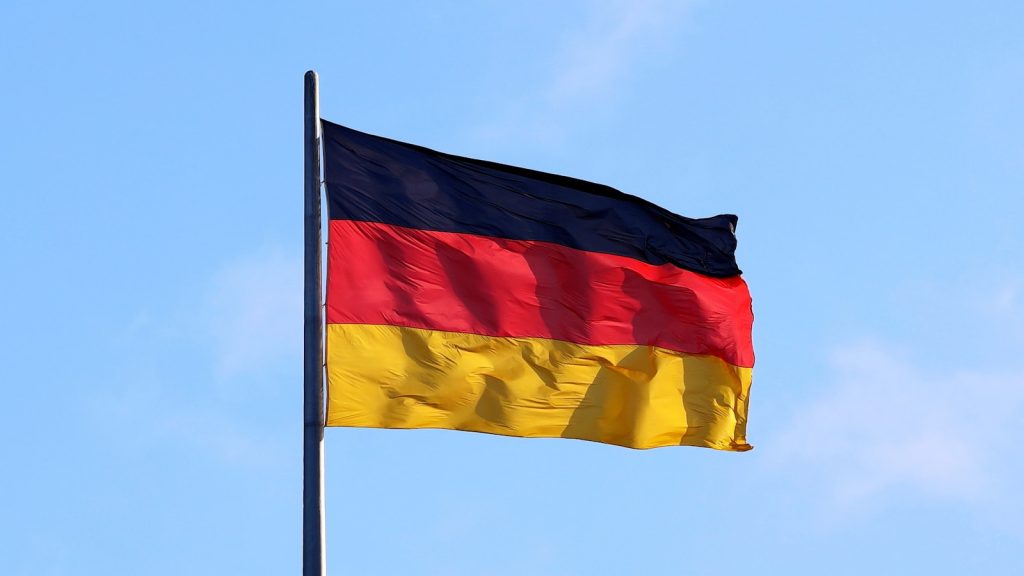 Electric Vehicle Sales in Germany Surge 43% in 2025 as Fleet Demand Leads a flag on a pole