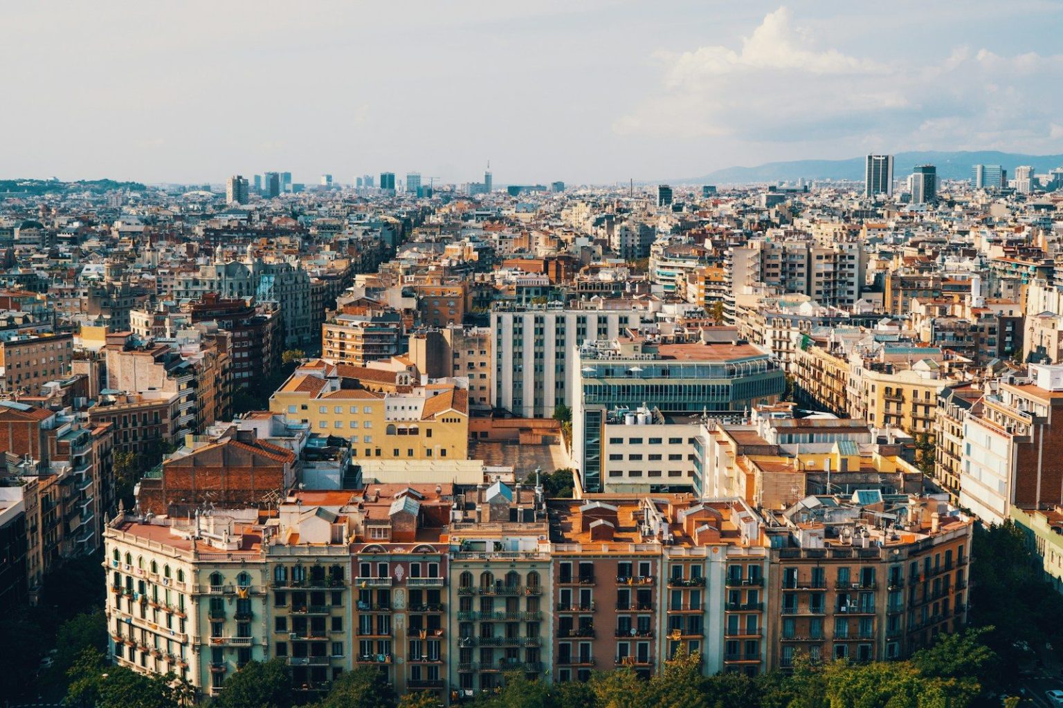 Barcelona Launches Subsidy Program to Accelerate Electric Moped Adoption aerial photography of city infrastructures