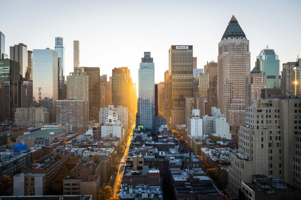 New York Allocates $30 Million to Expand EV Rebate Programme high rise buildings city scape photography
