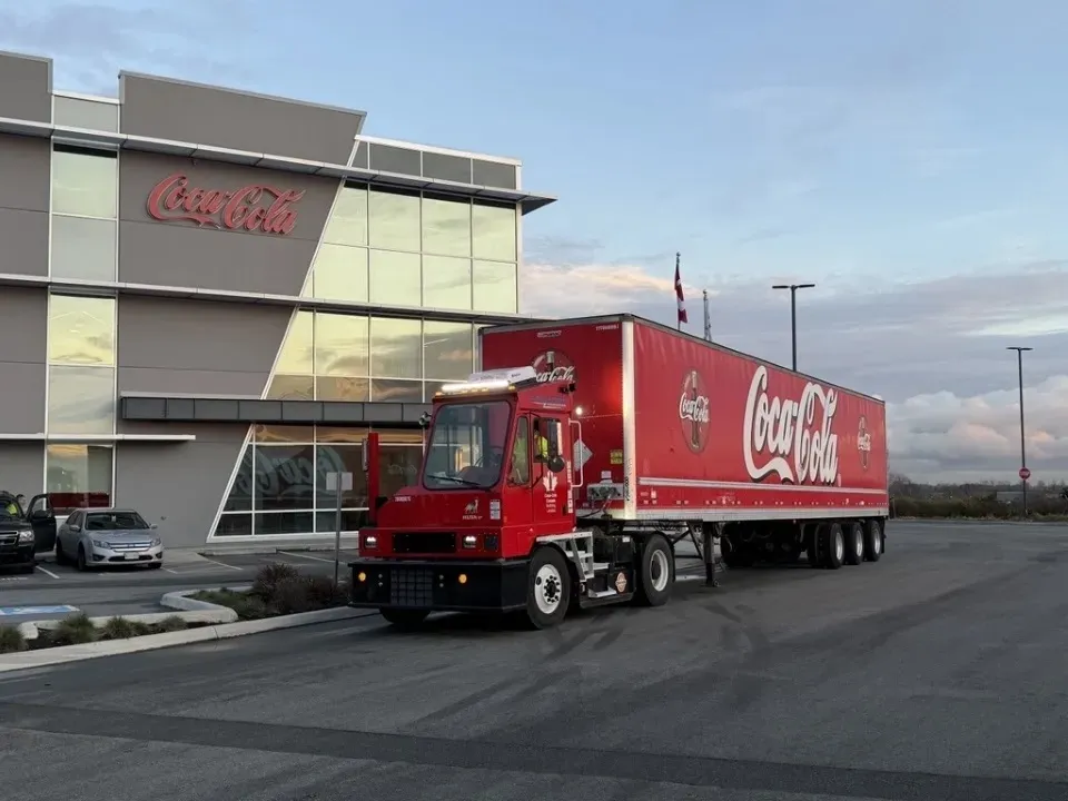 Orange EV Delivers 2,000th Electric Terminal Truck to Coke Canada Bottling