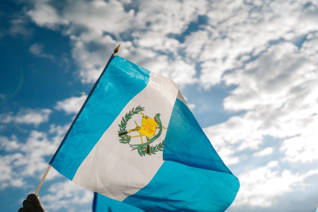 Guatemala Plans Procurement of 300 Electric Buses From 2027 blue and white flag under blue and white sunny cloudy sky during daytime