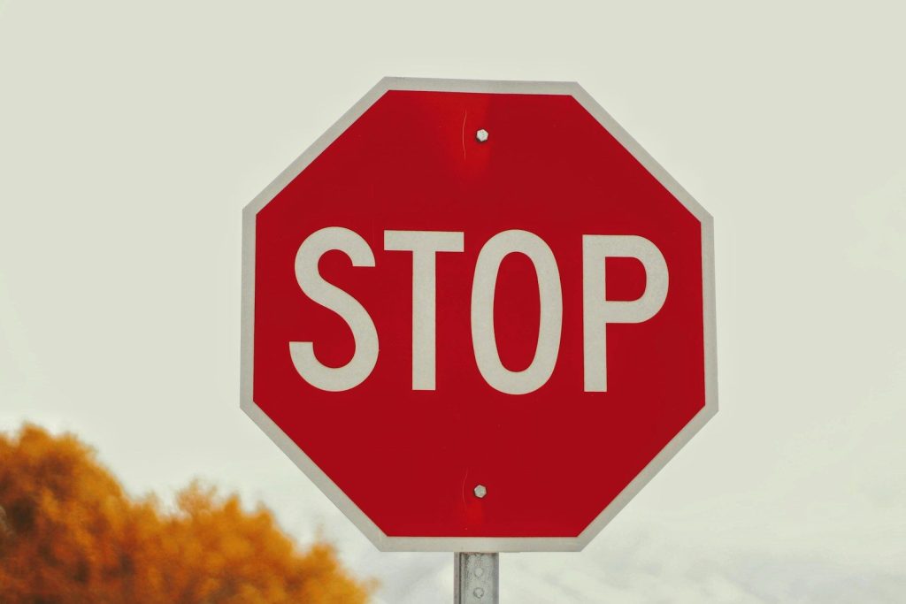 University of Michigan Study Finds Near-Miss Data Improves Autonomous Vehicle Safety selective-photography of stop signage